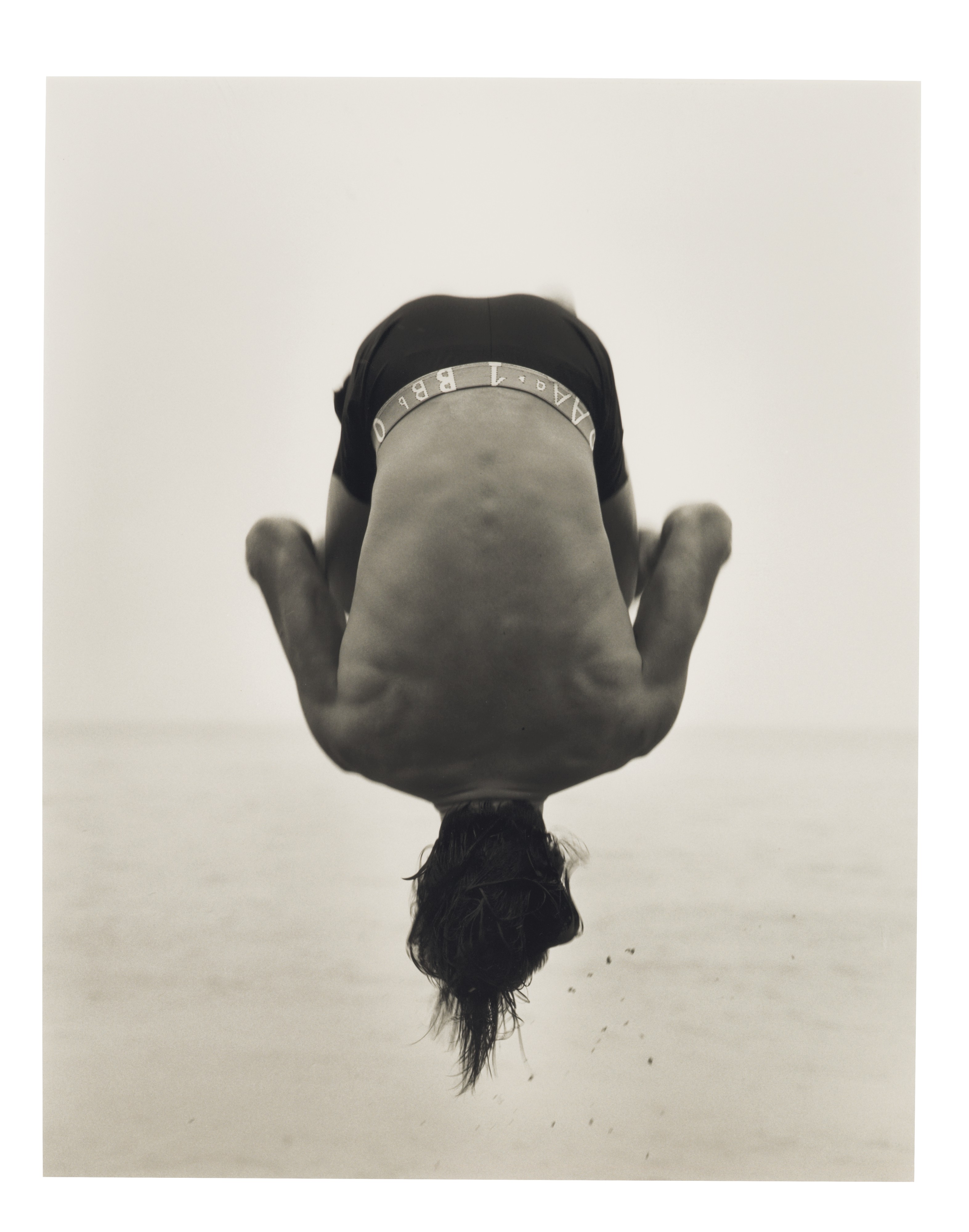 Herb Ritts, Backflip, Paradise Cove, 1987, $40,000-60,000 | The Collection of the artist, Malibu, California; Courtesy of the Herb Ritts Foundation